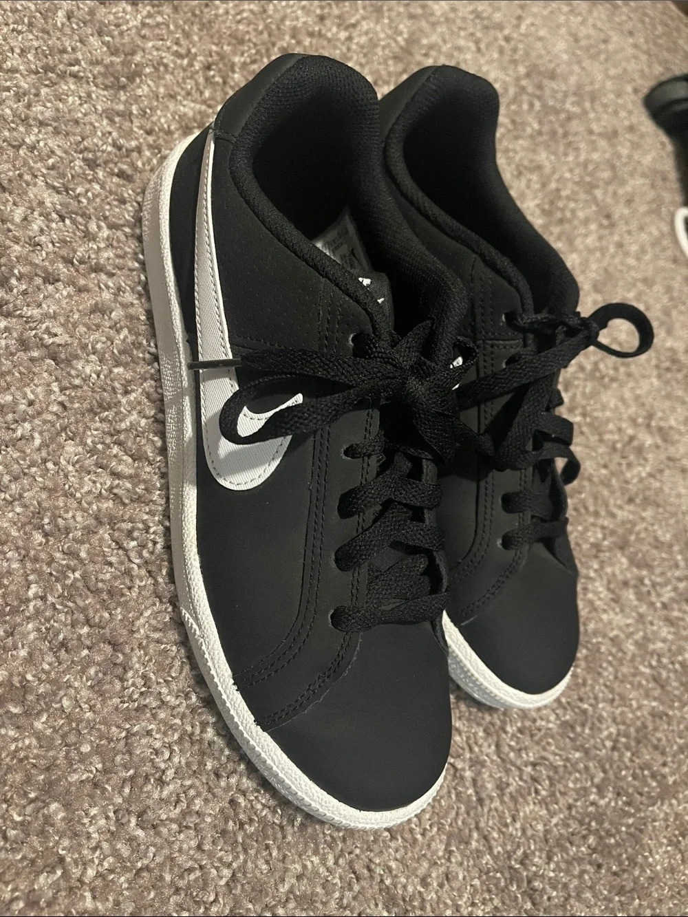 Nike women Black Sneakers with White Swoosh